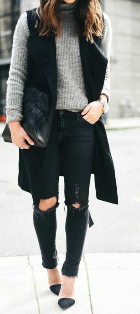 Long sleeveless black vest